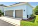 Spacious two-car detached garage with gray doors at 13662 Behring Ave, Orlando, FL 32827