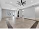 Bright living room with tray ceiling and tiled flooring at 13662 Behring Ave, Orlando, FL 32827