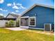 A charming backyard with a well-maintained lawn and screened-in patio at 148 Meadow Blvd, Sanford, FL 32771