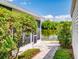 Scenic backyard featuring a beautiful lake view from the screened patio at 148 Meadow Blvd, Sanford, FL 32771