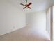 Bright bedroom featuring a ceiling fan and sliding door to the outside at 148 Meadow Blvd, Sanford, FL 32771