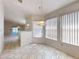 Bright dining area features patterned tile floors and large windows that let in natural light at 148 Meadow Blvd, Sanford, FL 32771