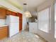 Cozy kitchen nook, showcasing white appliances and natural light, ideal for casual dining and meal preparation at 148 Meadow Blvd, Sanford, FL 32771