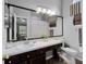 Bathroom featuring a large mirror, vanity, and plenty of counter space at 1527 Braewick St, Winter Springs, FL 32708