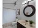 Bathroom showcasing a vanity with elegant fixtures and a bathtub with shower at 1527 Braewick St, Winter Springs, FL 32708