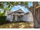Charming single-story home with a welcoming porch and well-maintained landscaping showcasing curb appeal at 1527 Braewick St, Winter Springs, FL 32708