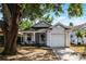 Charming house with a garage and covered front porch at 1527 Braewick St, Winter Springs, FL 32708