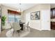 Cozy dining room with elegant chandelier and designer touches at 15366 Sandfield Loop, Winter Garden, FL 34787