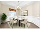 Formal dining room bathed in natural light, ideal for entertaining at 15366 Sandfield Loop, Winter Garden, FL 34787