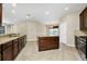 Well-appointed kitchen offering ample counter space and storage options at 15366 Sandfield Loop, Winter Garden, FL 34787