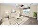 Elegant living room with neutral decor and plenty of natural light at 15366 Sandfield Loop, Winter Garden, FL 34787