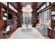 Home office with custom built-ins, hardwood floors, and great natural light at 1640 E Adams Dr, Maitland, FL 32751