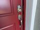 Close-up of the front door, featuring a modern digital keypad for enhanced security at 16927 Sw 25Th Terrace Rd, Ocala, FL 34473