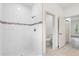 Beautifully tiled walk-in shower with decorative border and modern fixtures at 16927 Sw 25Th Terrace Rd, Ocala, FL 34473