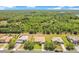 An aerial view showcasing the property's well-manicured lawn and verdant surrounding landscape at 18108 Bellezza Dr, Orlando, FL 32820