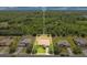 Overhead view of the property's location in a neighborhood surrounded by lush greenery at 18108 Bellezza Dr, Orlando, FL 32820