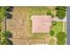 Bird's-eye view showing a tiled roof and mature trees, offering a sense of privacy and tranquility at 18108 Bellezza Dr, Orlando, FL 32820