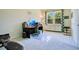 Bright office space featuring a computer, ergonomic chair, and a large window with natural light at 18108 Bellezza Dr, Orlando, FL 32820