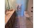 Bathroom with vanity, decorative mirror, and updated fixtures at 1872 N Akron Dr, Deltona, FL 32738