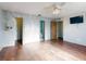 The bedroom is spacious and offers wood-look floors at 1872 N Akron Dr, Deltona, FL 32738