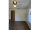 Bedroom with a ceiling fan, window, and closet at 1872 N Akron Dr, Deltona, FL 32738