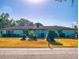 A long ranch style home with a well manicured front lawn at 1872 N Akron Dr, Deltona, FL 32738