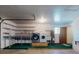 Spacious garage features laundry area, water heater, and ample storage and workspace at 1872 N Akron Dr, Deltona, FL 32738