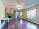 Inviting living area with plenty of natural light, a brick fireplace, and modern ceiling fan at 1872 N Akron Dr, Deltona, FL 32738