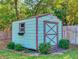 Exterior view of well-kept shed with windowbox and painted trim at 1872 N Akron Dr, Deltona, FL 32738