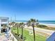 Balcony with ocean view, palm trees and pool area at 1926 Ocean Shore Blvd # 3120, Ormond Beach, FL 32176