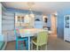 Dining room boasts ample shelving and adjacent breakfast bar at 1926 Ocean Shore Blvd # 3120, Ormond Beach, FL 32176
