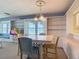 Open dining area with built-in shelving and ocean views at 1926 Ocean Shore Blvd # 3120, Ormond Beach, FL 32176