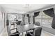 Dining room includes a mirror wall and tile floors at 1994 Excalibur Dr, Orlando, FL 32822