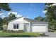 Charming single-story home featuring a modern design, complemented by a well-manicured lawn and colorful landscaping at 2013 Stone Wall Ct, Lake Hamilton, FL 33851
