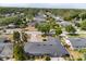 An elevated shot of the property in a quiet suburban neighborhood with mature landscaping at 2138 Whitehall Dr, Winter Park, FL 32792