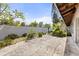 Backyard showcasing a patio, privacy fence, and mature trees at 2138 Whitehall Dr, Winter Park, FL 32792