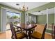 Cozy dining area with backyard access and plenty of sunlight, perfect for Gathering meals at 2138 Whitehall Dr, Winter Park, FL 32792