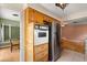 Classic kitchen featuring wooden cabinets and stainless steel appliances at 2138 Whitehall Dr, Winter Park, FL 32792