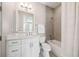 Bright bathroom with modern fixtures, a tub, and vanity at 220 S Summerlin Ave, Orlando, FL 32801