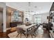 Sophisticated dining area with stylish furniture and decor, seamlessly connecting to the living space at 220 S Summerlin Ave, Orlando, FL 32801