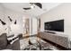 Inviting living room featuring a modern ceiling fan and stylish decor at 220 S Summerlin Ave, Orlando, FL 32801