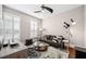 Cozy living room with modern decor, plush seating, and lots of natural light at 220 S Summerlin Ave, Orlando, FL 32801