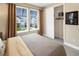 Bright bedroom with ample natural light, a spacious closet, and a minimalist design at 2332 Salty Winds Way, Kissimmee, FL 34747