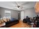 Functional bedroom with a dark color palette, providing a modern and cozy space at 2614 Mead Ave, St Cloud, FL 34771