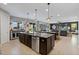 Spacious kitchen with a large island, stainless steel appliances, and an open layout concept at 2614 Mead Ave, St Cloud, FL 34771