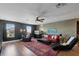 Bright living room featuring stylish furniture, a ceiling fan, and ample natural light at 2614 Mead Ave, St Cloud, FL 34771