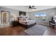 Serene main bedroom boasting a calming color palette, water view, and stylish furnishings at 2614 Mead Ave, St Cloud, FL 34771
