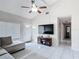 The living room has vaulted ceilings, neutral walls and tile flooring at 2803 Charing Cross Way, Orlando, FL 32837