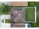 Aerial view of a house with solar panels on the roof and a well-maintained backyard at 2806 Polson Dr, Kissimmee, FL 34758