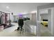 Bonus room with workout equipment and view into bedroom at 2806 Polson Dr, Kissimmee, FL 34758